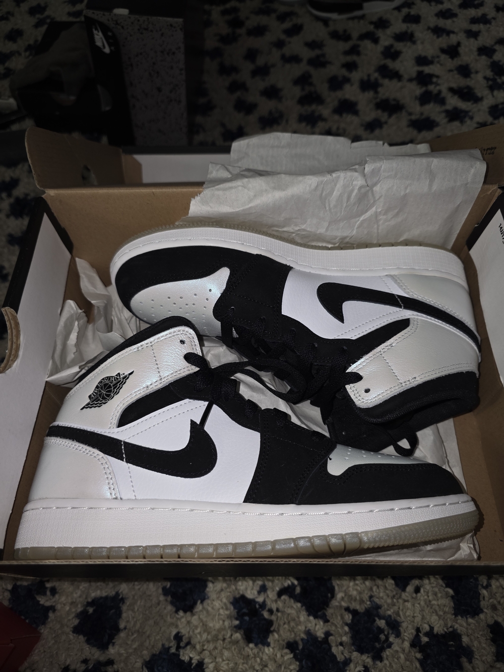 Jordan Air Jordan 1 Mid White and Black Sneakers
